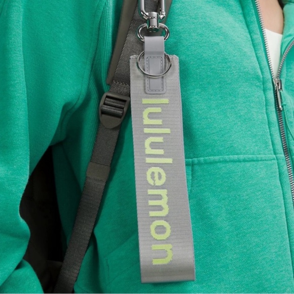 New and Authentic Lululemon Never Lost Keychain Rhino Gray /‎ Electric Lemon